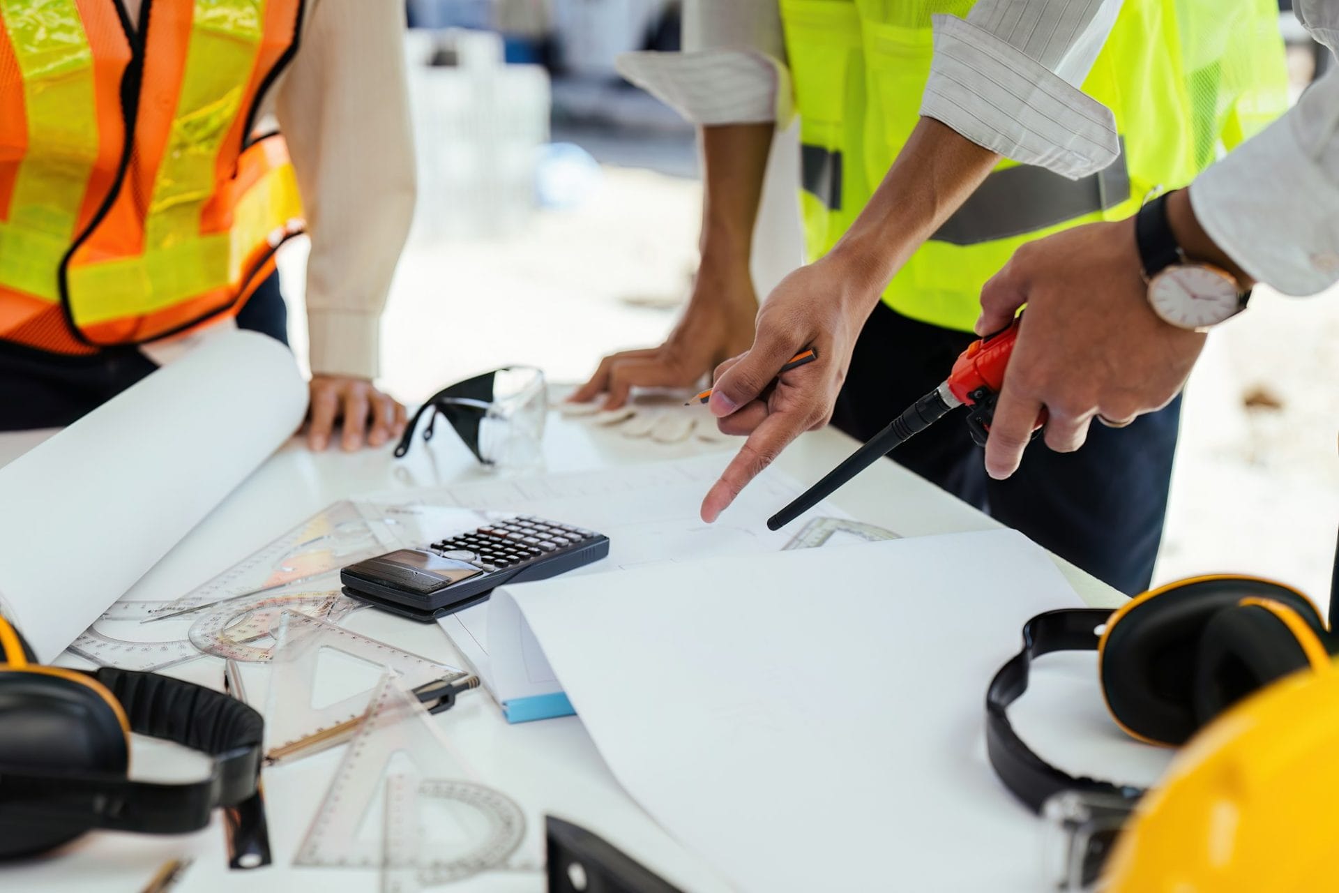 team engineer, foreman, architect meeting for colleagues discussing and checks construction